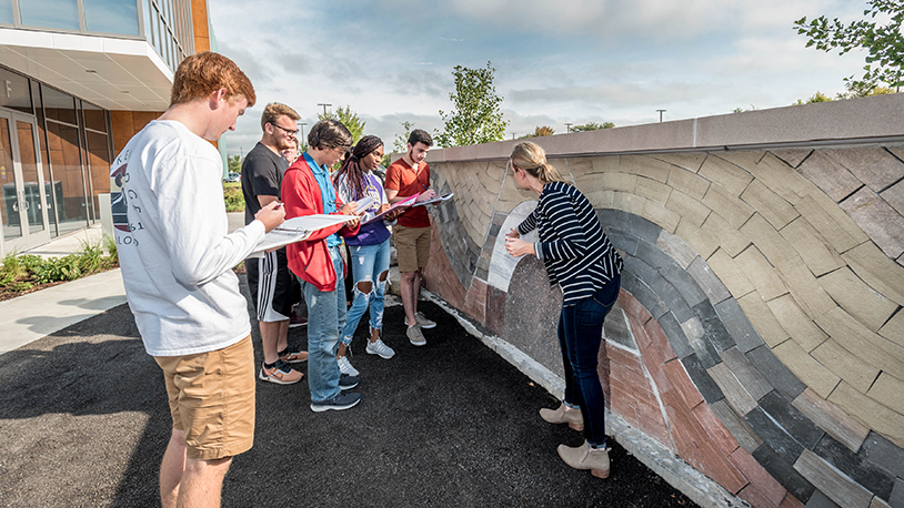 Kate teaching at the geo-scene wall